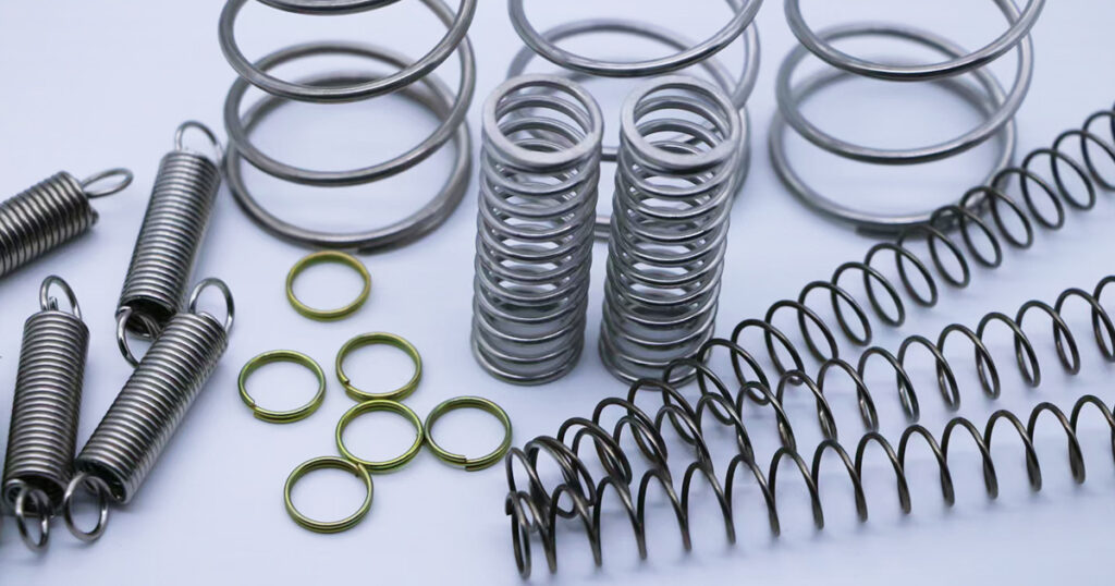 Types of industrial springs including compression, extension, and custom springs manufactured by DINGLI Spring