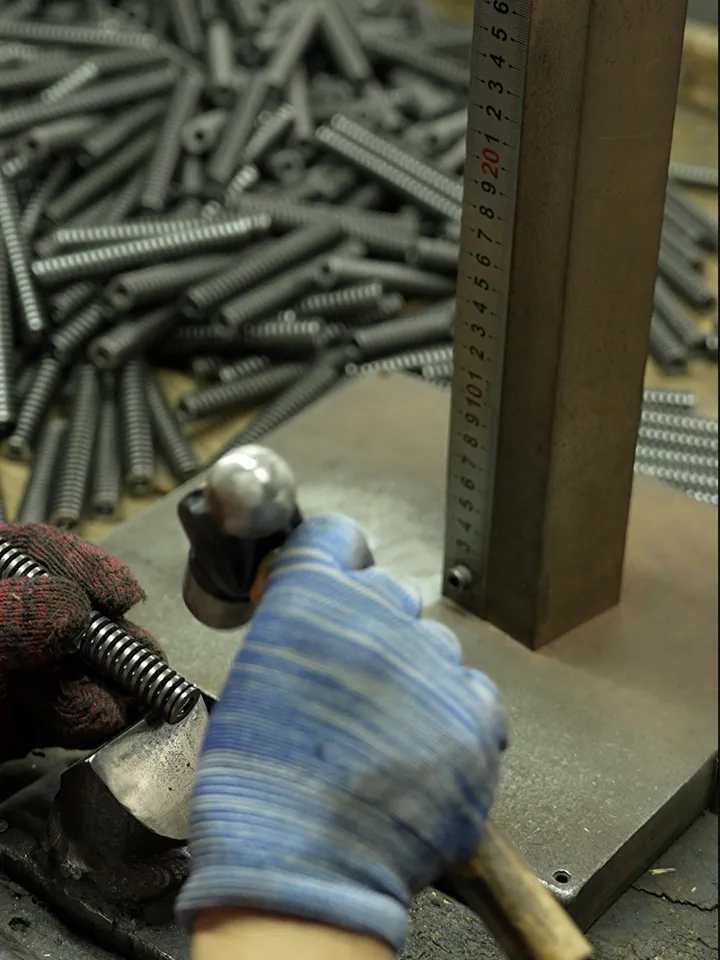 Spring correction tools including precision calipers, measurement gauges, and specialized pliers for compression spring calibration