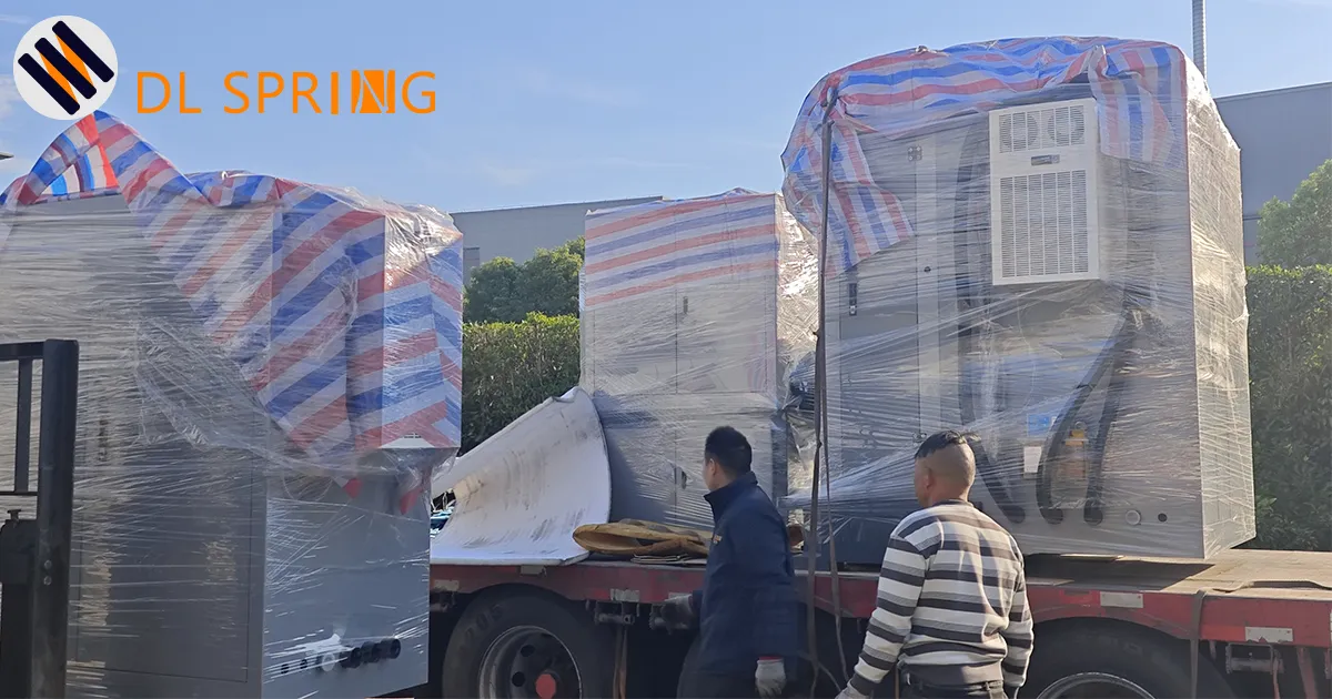 New spring coiling machine wrapped in protective packaging on delivery truck at Dingli Spring factory