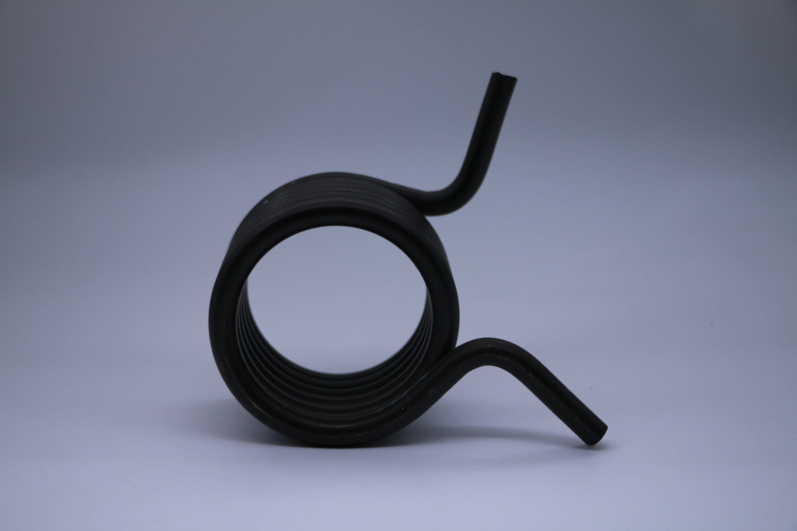 Axial view of a torsion spring with two bent legs